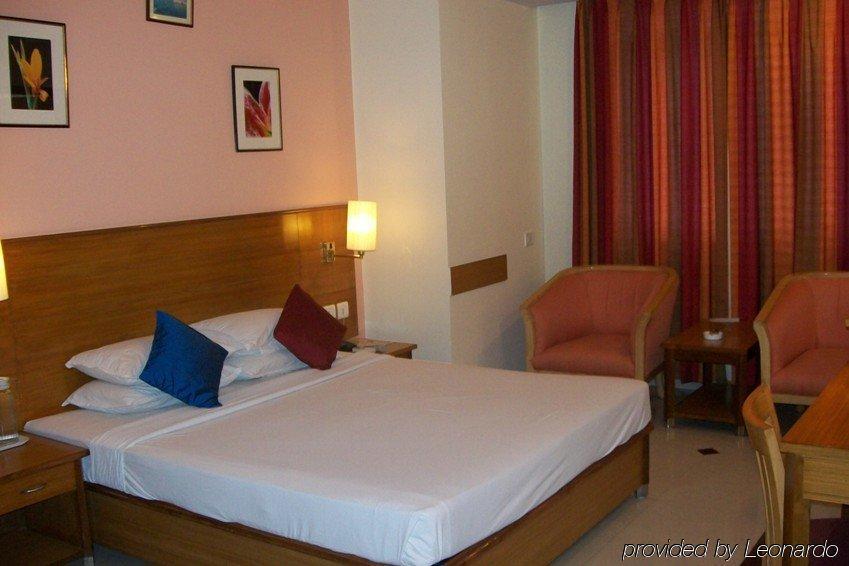 Ramanashree Brunton Otel Bangalore Oda fotoğraf